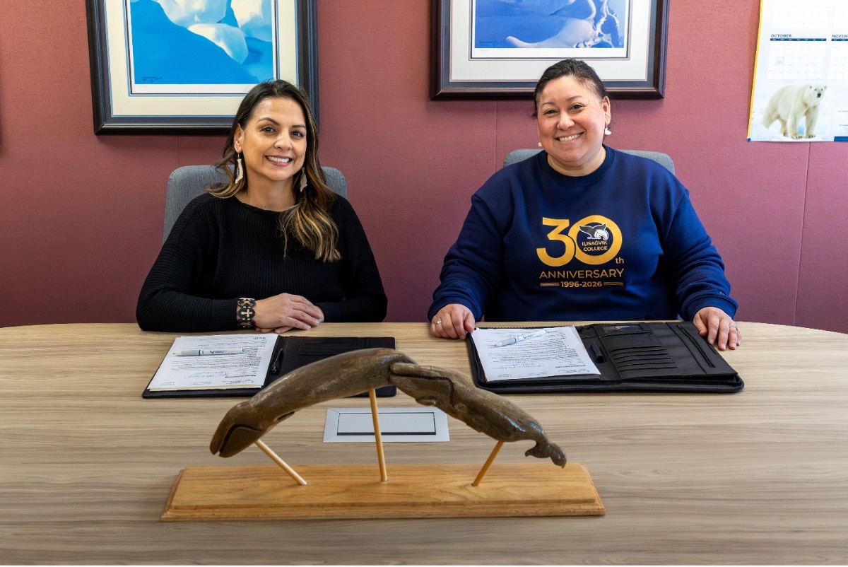 Justina Wilhelm (left), President of Iḷisaġvik College, and Dr. Pearl K. Brower, UIC President and CEO, sign the agreement for the purchase of a 15-acre site in Utqiaġvik that will serve as the future home of a new Iḷisaġvik College campus. The partnership marks a significant milestone in supporting education, workforce development, and future opportunities for the North Slope region.