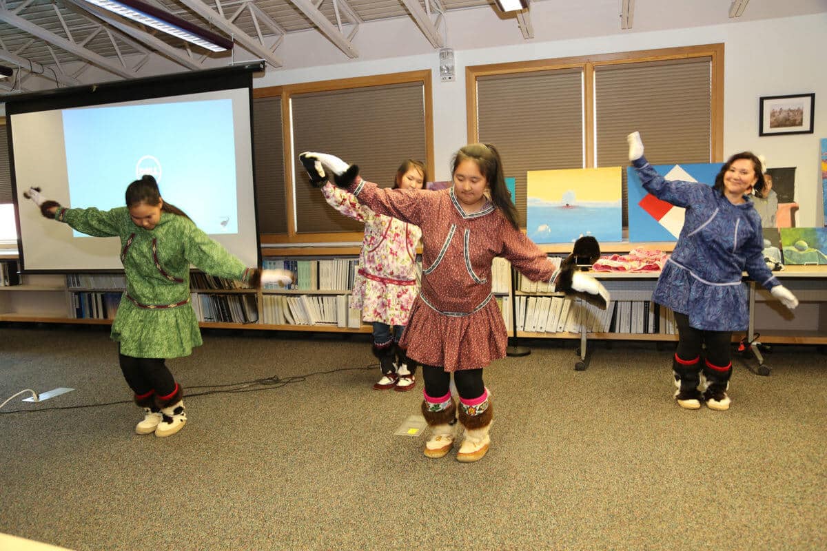 Students practicing traditional dance at Iḷisaġvik College. (3)