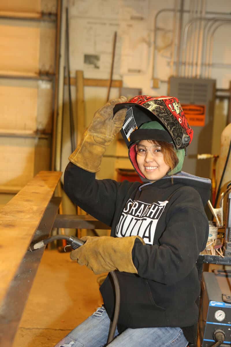 Student practicing her welding.