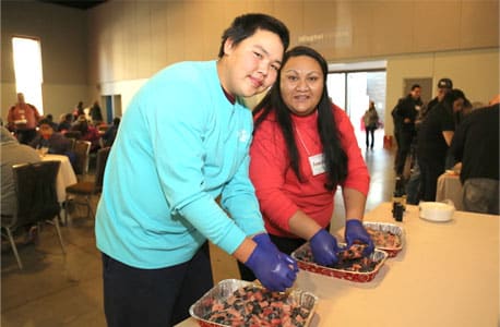 North Slope Borough residents prepare traditional Alaska Native foods.