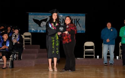 Graduate receiving diploma