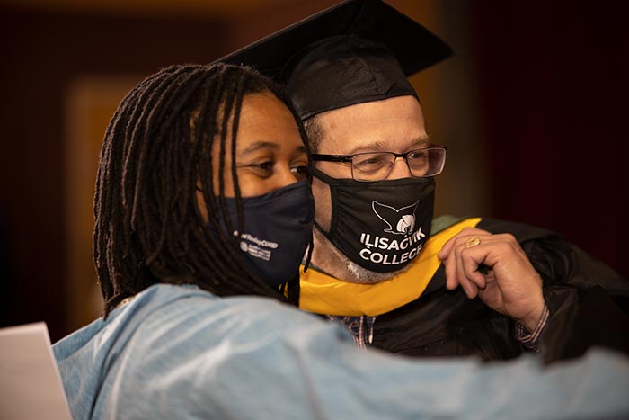 graduates wearing masks