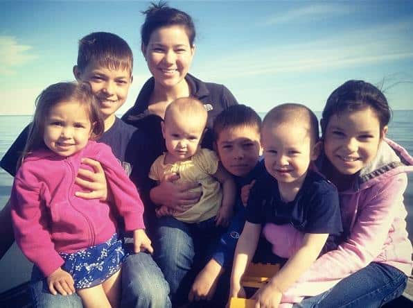 Alison with six children.